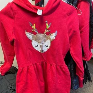 Size 12 reindeer sweater dress. Carters brand. No tags. Never worn.